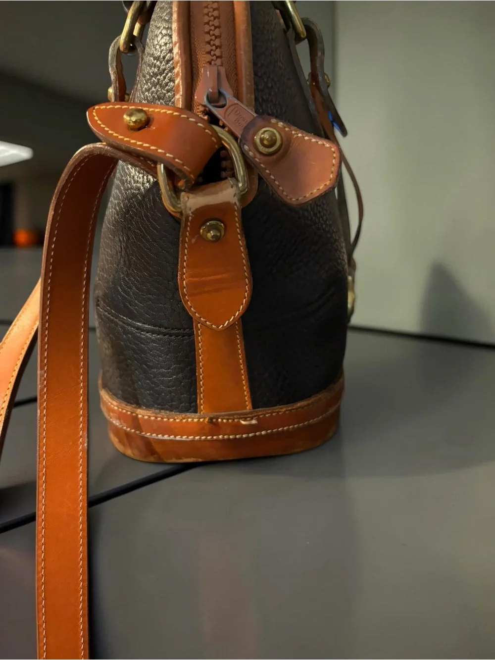Dooney & Bourke Black Leather Satchel with Tan Trim
